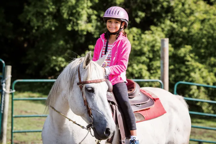 Girl riding a horse
