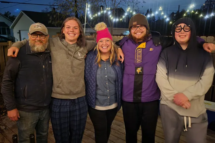 Cheri and her family pictured in 2024