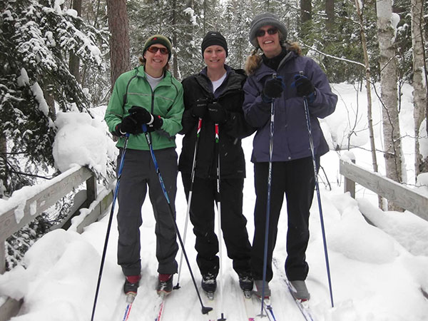 Enjoying the magic of winter camping are (left to right) Shannon Thompson, Ellie Zuehlke & Heather Logelin