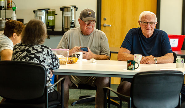 YMCA ForeverWell participants enjoying a coffee break together.