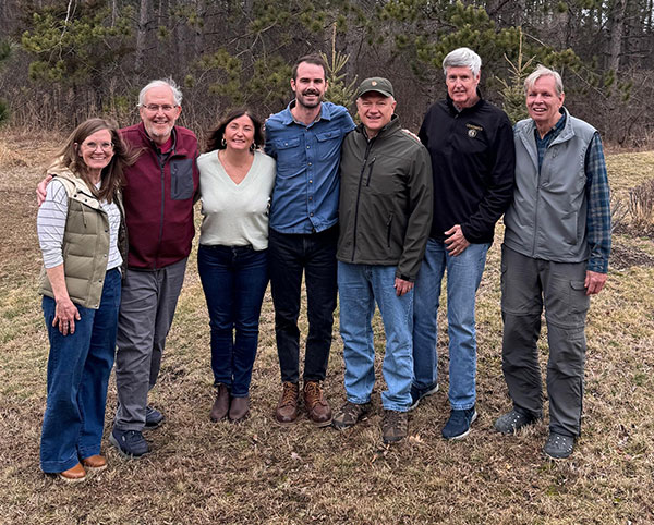Former Camp St. Croix directors gather to celebrate new executive director Dan O’Brien in April 2025. From left to right: Amy Schneider, John Duntley, Michele Tigan, Dan O’Brien, Rob Schultz, Mike Bussey, and Tom Kranz.