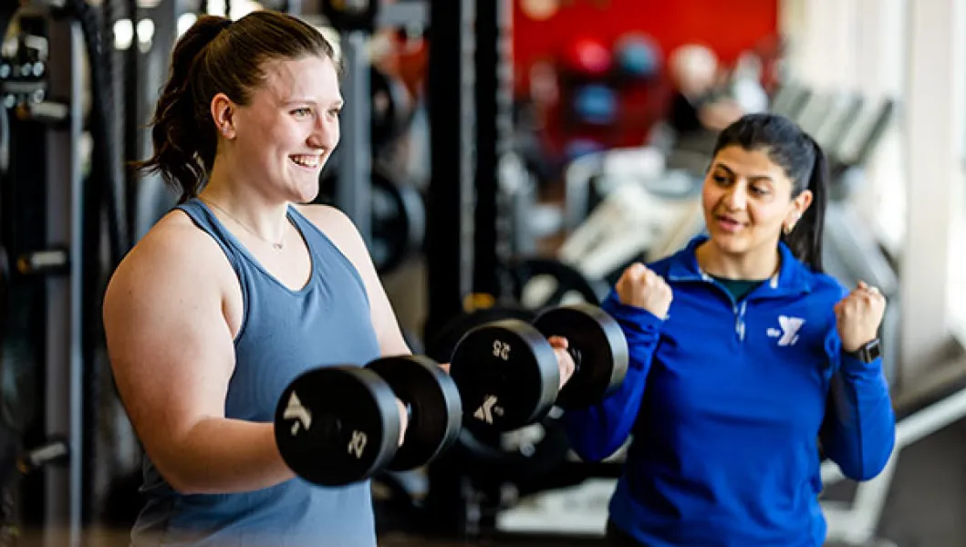 YMCA personal trainer and client
