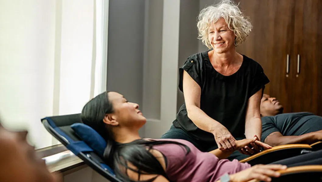 YMCA group acupuncture practitioner and client