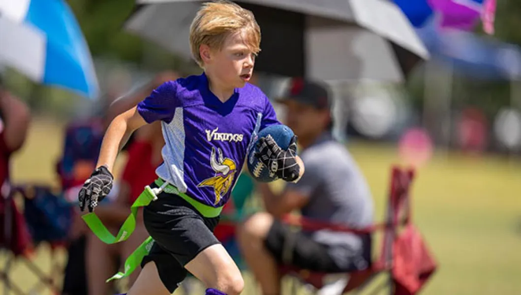 YMCA flag football player
