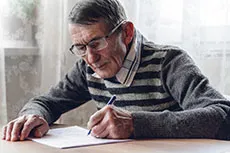 Man writing a letter
