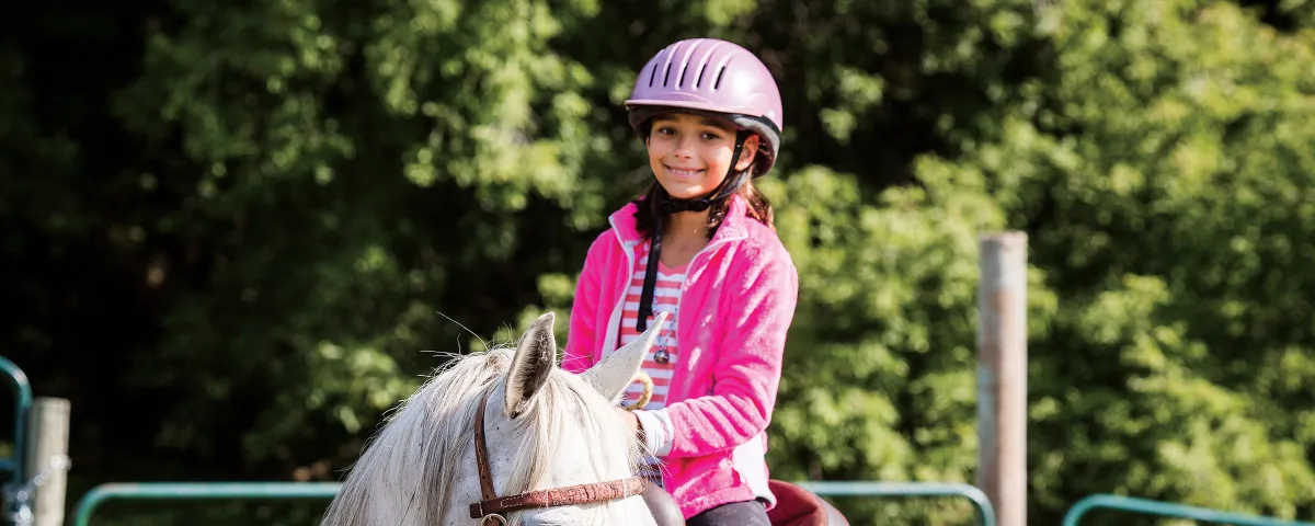 Girl riding a horse