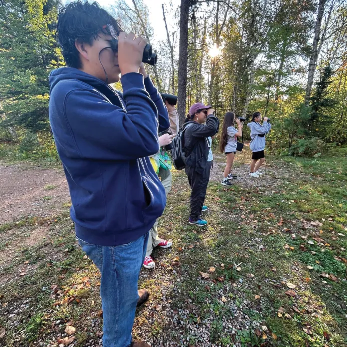 Students birdwatching.