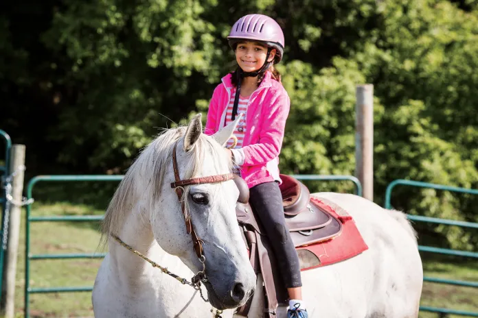 Girl riding a horse