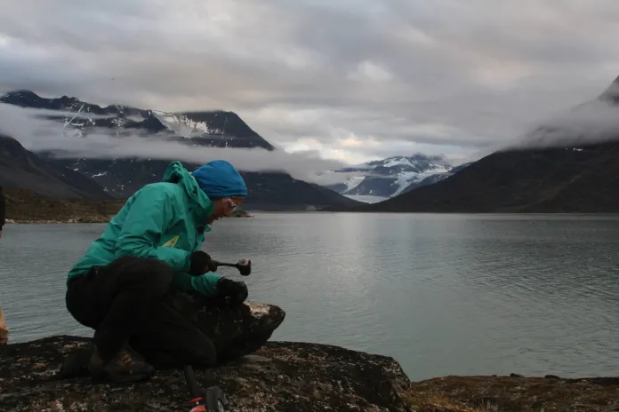 Collecting rock sample from a glacial moraine close to the Arctic Circle on Baffin Island.