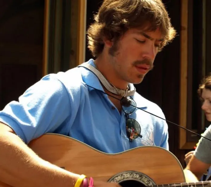 Reid Petit, playing music while on staff in 2010.