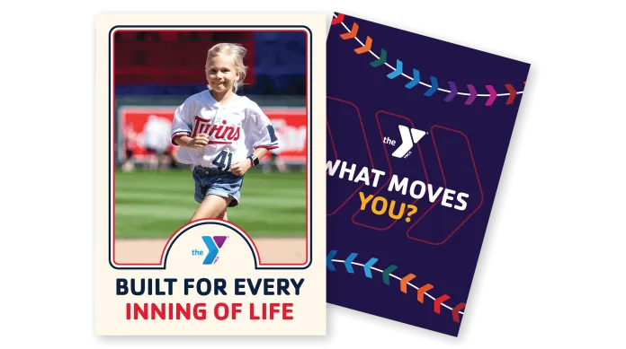 A promotional card shows a young girl running on a baseball field in a Twins jersey above the text “BUILT FOR EVERY INNING OF LIFE,” beside a tilted purple YMCA-style card reading “WHAT MOVES YOU?”