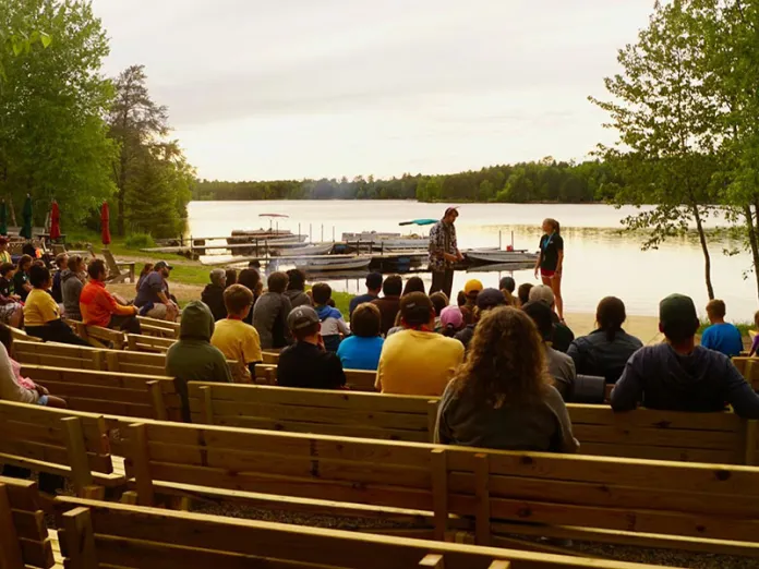 Campers lakeside at Camp Northern Lights