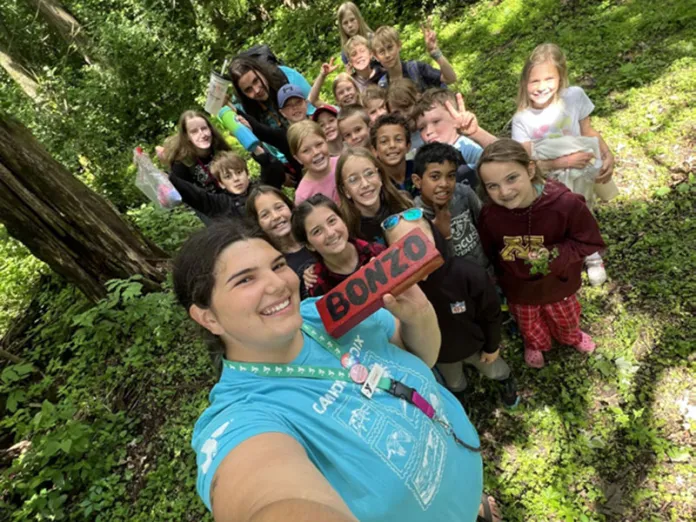 Campers and staff proudly show off their Bonzo find!