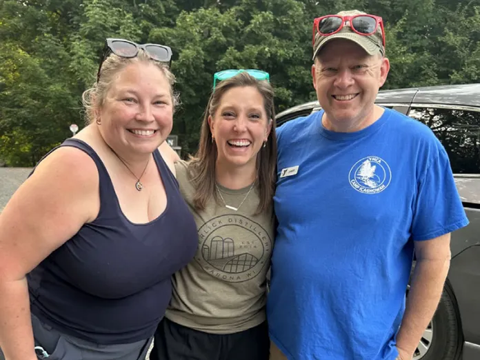 Ruth, Melissa Ingram, and James at Icaghowan on check in day. Melissa was part of their WLC group in 2001.