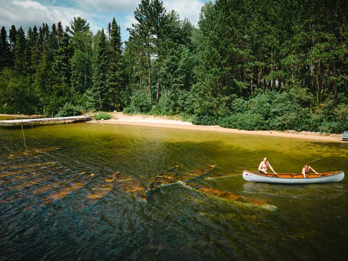 Widjiwagan’s Seglia canoes, sunken for their protection
